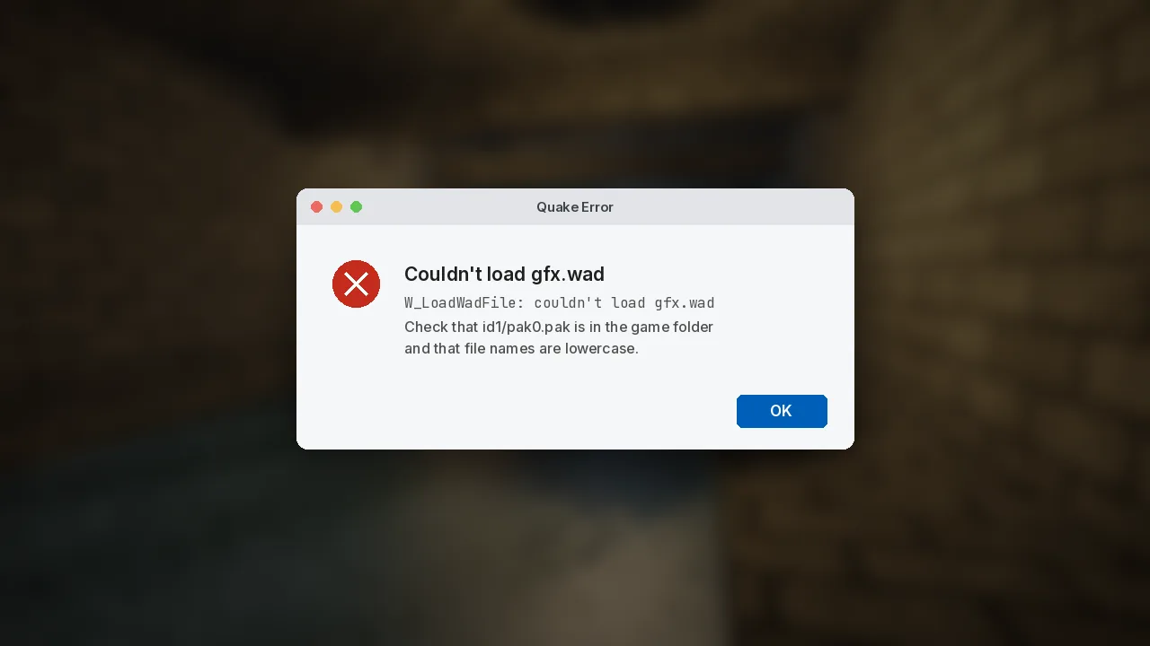Quake Error dialog reporting that gfx.wad could not be loaded and advising to check for id1 pak0.pak