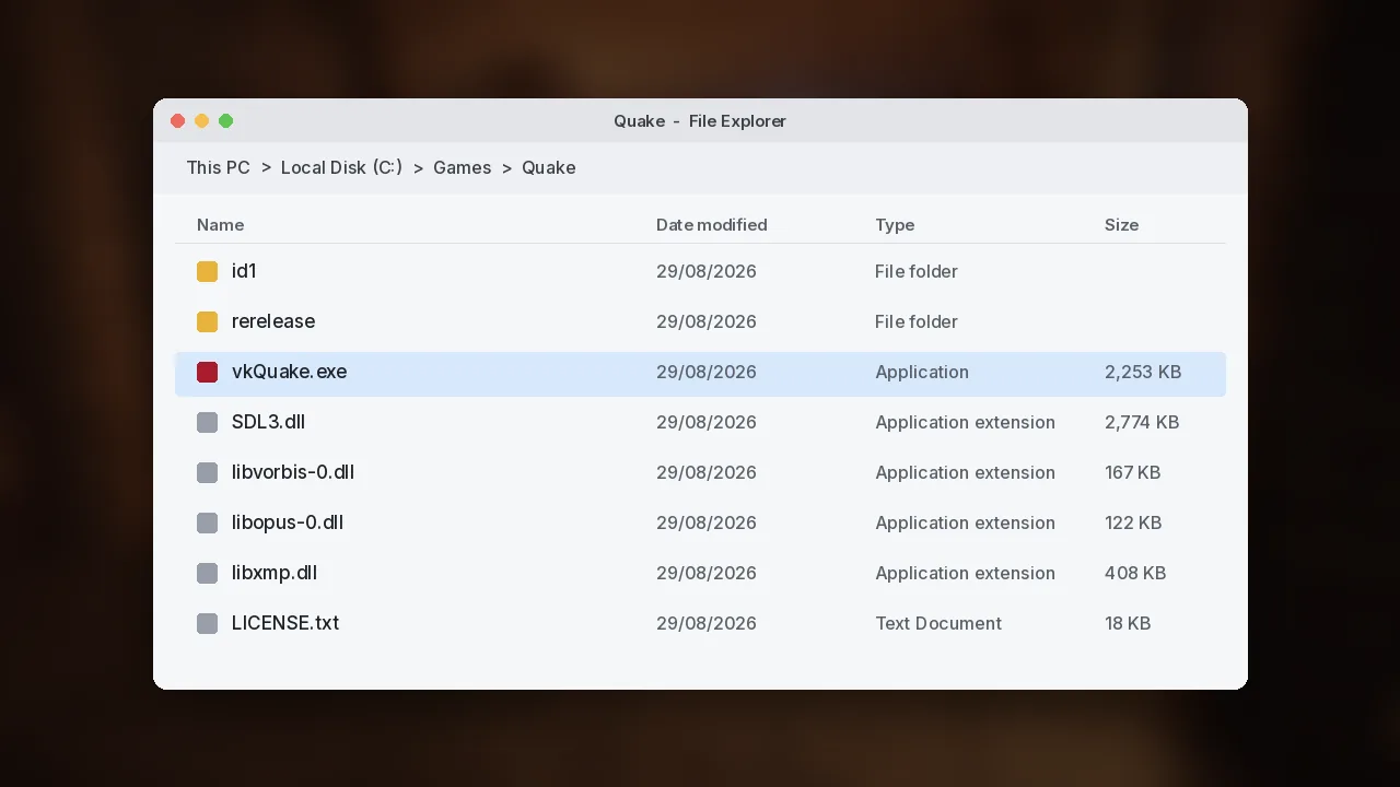 Windows File Explorer showing vkQuake.exe, SDL3.dll and the id1 folder inside a Quake directory